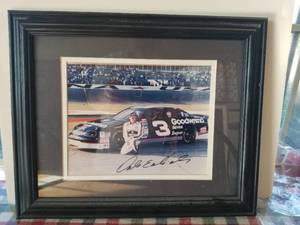 lot 1 image: Dale Earnhardt Sr. Autographed framed 8 x 10 with C.O.A -