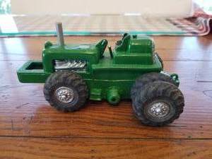 lot 52 image: Auburn rubber toy tractor