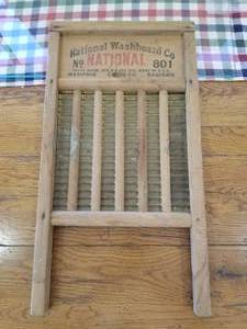 lot 80 image: Vintage wooden wash board with good graphics
