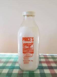 lot 18 image: Prices Farms Dairy -Hazleton, PA. glass quart milk bottle with lid