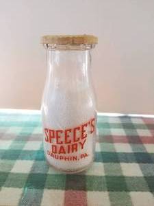 lot 27 image: Speeces Dairy -Dauphin, PA. - 12 pint glass milk bottle with lid