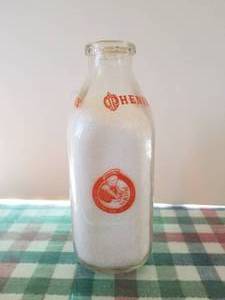 lot 48 image: Phenix milk quart glass milk bottle with lid