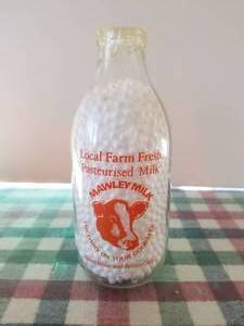lot 49 image: Mawley milk pint glass milk bottle