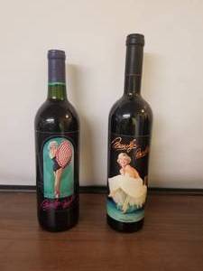 lot 94 image: Marilyn Moneroe full wine bottles - 1990 and 1994 - unopened