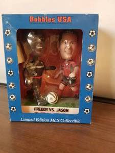 lot 113 image: Limited Edition MLS Collectible Bobbles USA Freddy vs. Jason Bobble heads