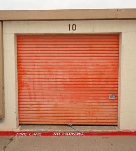 lot 4 image: F010 - 10 X 20 LOCKER FULL OF GENERAL HOUSEHOLD INCLUDING WASHER, DRYER, BED FURNITURE, & MORE