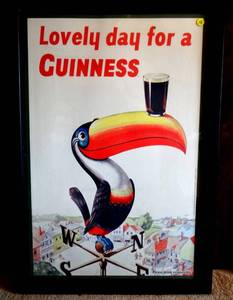 lot 13 image: AWESOME LOVELY DAY FOR A GUINESS POSTER - FRAMED UNDER GLASS - APPROX 22 X 33