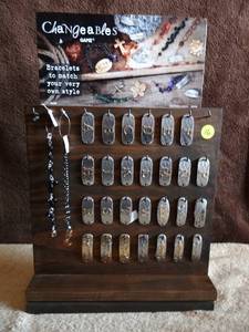 lot 16 image: CHANGEABLES BRACELET DISPLAY WITH 47 PIECES AS SHOWN