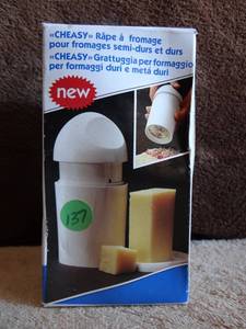 lot 137 image: CHEESE GRATER - NIB