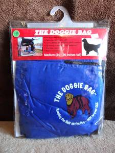 lot 179 image: THE DOGGIE BAG HAIR SHEDDING FOR MEDIUM DOGS - 24-26 - NIB
