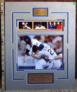 lot 194 image: AWESOME NOLAN RYAN COMMEMORATIVE WALL DISPLAY FEATURING THE FIGHT WITH ROBIN VENTURA - APPROX 16 X 20
