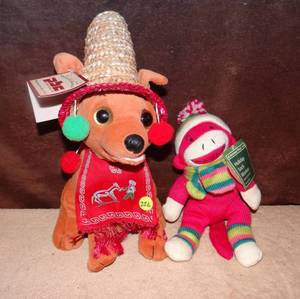 lot 226 image: Pbc International Animated Singing And Dancing Feliz Navidad Festive Christmas Chihuahua Plush & Holiday Sock Monkey - both wtags