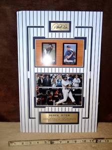 lot 254 image: NEW YORK YANKEES DEREK JETER WALL DISPLAY - MATTED WITH PHOTO & METAL NAME PLATES - APPROX 12 X 19