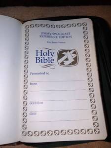 lot 284 image: JIMMY SWAGGERT REFERENCE EDITION KING JAMES HOLY BIBLE IN STORAGE CASE