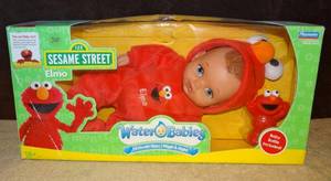 lot 300 image: ULTRA RARE SESAME STREET WATER BABIES ELMO IN ORIGINAL BOX - UNOPENED $$$$