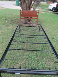 lot 20 image: Black twin bed frame with springs and twin mid-modern brown headboard