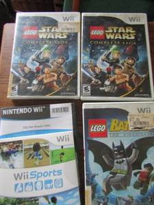 lot 42 image: Wii Games- Star Wars x 2, Batman, Wii Sports 2 disc Billy the Wizard