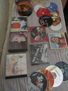 lot 79 image: Assorted music CDs many not in case- Willie nelson, Bob Marley, Anita Cochran and many more