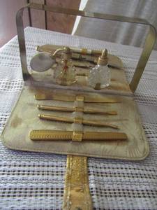 lot 82 image: Vintage manicure set. Gold plated- 2 Perfume bottles in original package, nail file and cuticle clippers