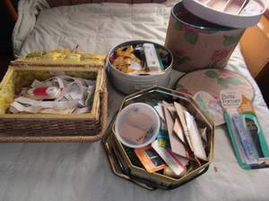 lot 97 image: Floral sewing basket, Wicker sewing basket and tin full of sewing notions