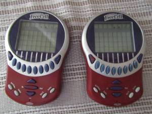 lot 103 image: 2 FreeCell hand held card games battery operated