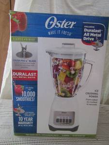 lot 114 image: Oster smoothie blender used but like new in original box with instructions