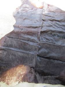 lot 118 image: COWHIDE Rug  Dark Brown 68x54