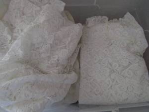 lot 130 image: Plastic tote full of lace tablecloths (at least 5)