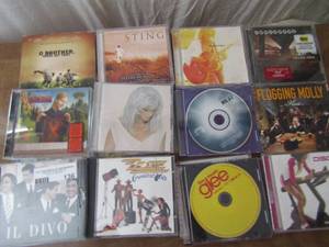 lot 136 image: Over 20 Country Music CDs. Artists and titles as shown