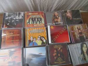 lot 138 image: Over 20 Country Music CDs. Artists and titles as shown