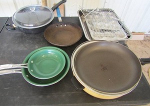 lot 10 image: Pot & Pan lot. Some with lids, metal muffin tins, hot dog rack