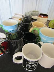 lot 12 image: Coffee Cups- Jack Daniels, Snake bite hot sauce and more