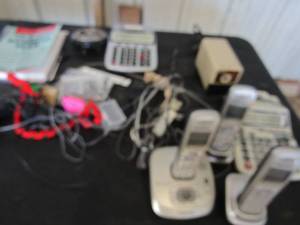lot 27 image: Home phones, calculator, electric pencil sharpener
