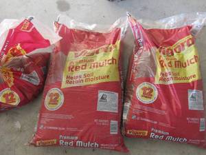 lot 59 image: 2.5 bags of Virgo red flower bed mulch