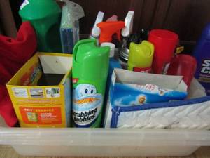 lot 68 image: Lot of household cleaners open, Hummingbird feeder Mr. Bubbles, Magic Erase and wood polish