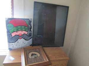 lot 75 image: Raccoon art 17x14   Santa canvas 20x16   black shadow box 31x25x3