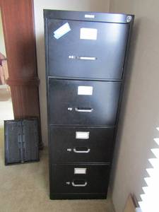 lot 76 image: Millers office furniture Black 4 drawer filing cabinet empty file folders included