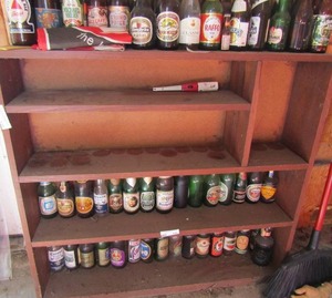 lot 127 image: 5 tier brown shelf 36x39x7 (contents not included)