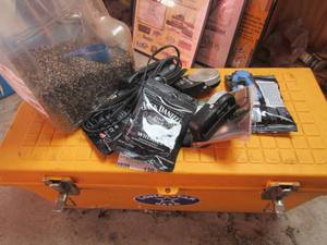lot 130 image: Jack Daniel Mellowing charcoal, used 5 lb. tub black pepper and yellow tool box