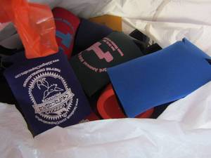 lot 175 image: Bag full of Cozies and Pig wall hanging