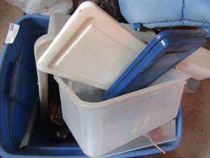 lot 177 image: Tote of small plastic totes, bedside fans and flashlights