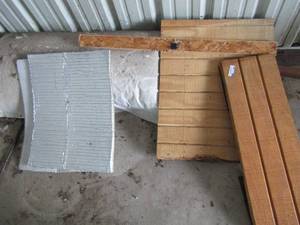 lot 186 image: Wood pieces and one roll of insulation