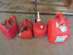 lot 198 image: 3 small gas cans and 1 large without lid