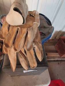 lot 199 image: Black tool box of door hinges, booster cables and white gloves