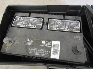 lot 229 image: 12 volt battery and box