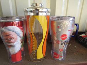 lot 231 image: Coca-Cola cups and straw holders