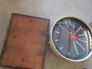 lot 228 image: Wall clock and cutting board