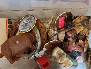 lot 207 image: Clear tote of cooking team T shirt pins, pig magnets recipe box