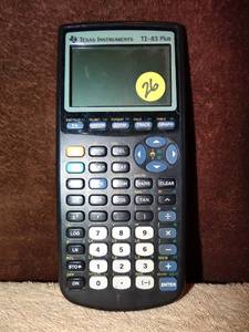 lot 26 image: TEXAS INSTRUMENTS TI-83 CALCULATOR