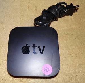 lot 40 image: APPLE TV STREAMING DEVICE WCHARGER